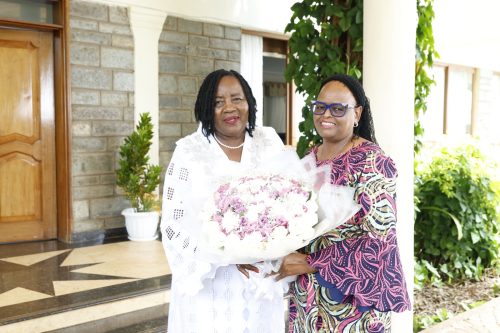 Martha Koome holds a flower alongside Ida Odinga near the Odinga family home in Bondo. PHOTO/@CJMarthaKoome/X