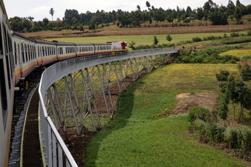 A Kenya Railways passenger train crosses a steel bridge. PHOTO/@KenyaRailways_/X