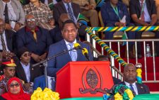 Zambian president Hichilema evacuated from market as angry crowd hurl stones at the podium