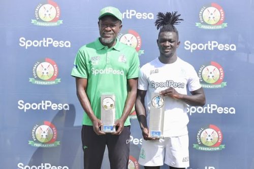 Shariff Musa and coach Charles Akonnor pose with their awards.