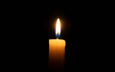Parliament holds emotional candlelight tribute for fallen staffer