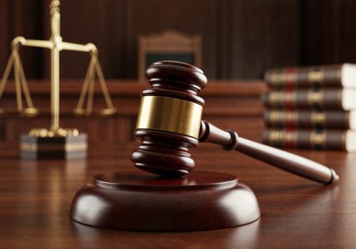 A judge’s gavel placed on a wooden desk during court proceedings. PHOTO/PEXELS