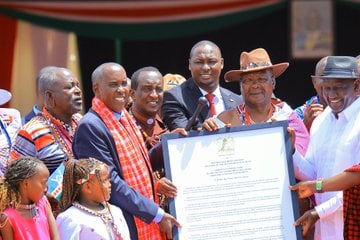 President William Ruto hands over Amboseli National Park to Kajiado County. PHOTO/@OleNtutuK