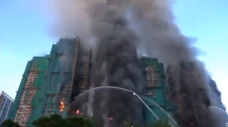 A screengrab of Hong Kong fire tragedy captured by People Daily Digital. PHOTO/@volcaholic1/X