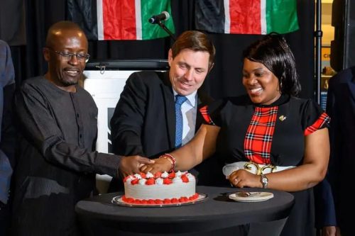 City of Brampton Mayor His Worship Patrick Brown, Kenya High Commissioner to Canada H.E. Amb. Carolyne Kamende Daudi and Hon. Jaoko Oburu Odinga, Special Advisor, Office of the President, Republic of Kenya - cutting a cake to commemorate Kenya Independence Day at the flag raising ceremony in Ontario, Canada. PHOTO/KCA