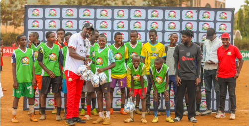 FKF Deputy President McDonald Mariga poses for a photo with youth footballers. PHOTO/@Football_Kenya/X