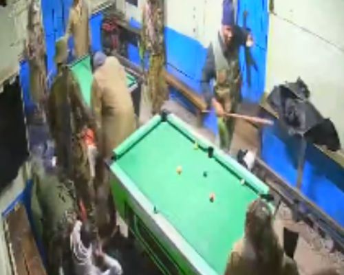 Police officers assaulting youth playing pool in Nandi County. PHOTO/Screengrab by People Daily Digital