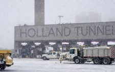 More than 5,000 flights cancelled as US east coast digs out of record snow