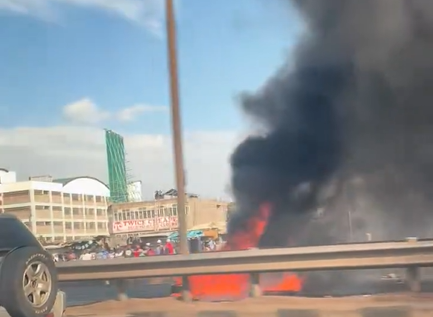 Flames rise from burning tyres on the Thika Superhighway. PHOTO/Screengrab by People Daily Digital/@RASHADz_/X