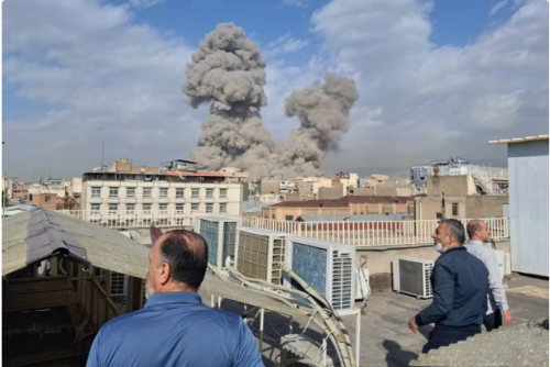 An image of people watching as the USA and Israel release airstrikes on Tehran, Iran. PHOTO//Screengrab by people Daily Digital