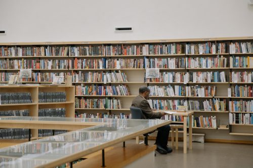 Man immersed in reading at a library. Photo used for illustration purposes. PHOTO/Pexels
