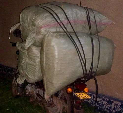 Motorcycle carrying three sacks of suspected cannabis sativa weighing approximately 100 kilograms. PHOTO/@NPSOfficial_KE/X