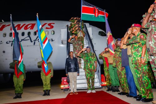 Deputy National Security Adviser Joseph Boinnet and Deputy Inspector General, Kenya Police Service, Eliud Lagat, lead the 208 officers of the National Police Service (NPS) from the Haiti mission deployment upon their arrival at JKIA.PHOTO/@NPSOfficial_KE/X
