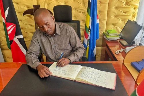 Deputy President Kithure Kindiki signs a guest book during a high-level security briefing in Meru. PHOTO/@_KithureKindiki/X