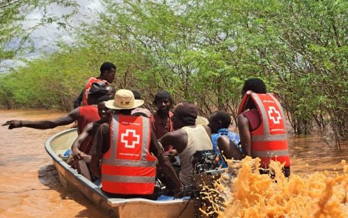 Members of the Kenya Red Cross Response Team in action at the river. PHOTO/https://redcross.or.ke/floods/