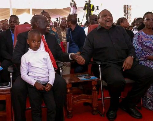 fourth presdient Uhuru Kenyatta shairing light moments with the former deputy presdient rigathi gachagua. PHOTO//Screengrab by People Daily Digital