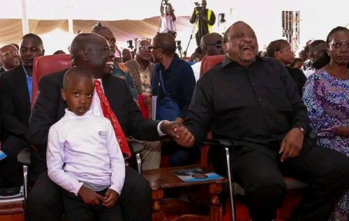 fourth presdient Uhuru Kenyatta shairing light moments with the former deputy presdient rigathi gachagua. PHOTO//Screengrab by People Daily Digital