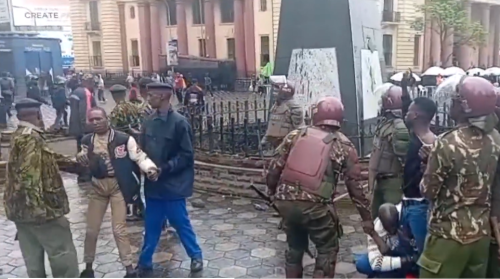 Police officers arrest some of the fuel protesters at the Kenya National Archives area in Nairobi CBB on Tuesday, April 21, 2026. PHOTO/Screengrab by People Daily Digital from a video shared on X by @citizentvkenya