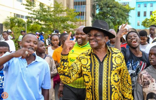 Siaya Governor James Orengo interacts with the youth at a voter registration centre. PHOTO/@orengo_james/X