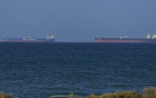 Tankers exit Hormuz as Trump, Vance talk up Iran deal prospects