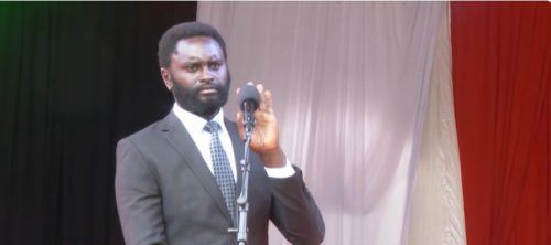 Nyandarua Senator John Methu testing the microphone after it was briefly switched off during the requiem mass of the late Ol Kalou MP on Wednesday, April 8, 2026. PHOTO/ Screengrab by PD Digital/@StateHouseRepublicofKenya/YouTube