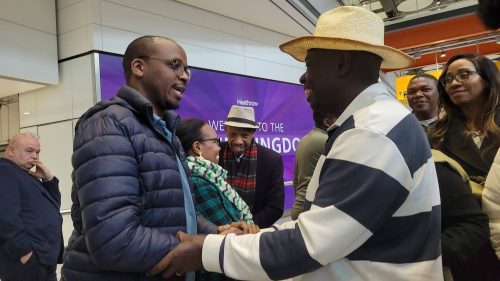 Second Deputy President acknowleging greetings from Kenyans leaving in the United Kingdom upon his arrival. PHOTO//Kenyans living in the United Kingdom are waiting for the arrival of the former deputy dresident at heathrow iaport in london. PHOTO//Rigathi Gachagua after his arrival in the UK for his tour of England. PHOTO//https://web.facebook.com/profile.php?id=100042978711245