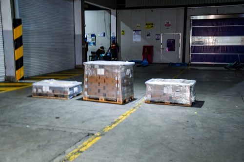 Ballot papers and statutory forms stacked in boxes at JKIA after arrival ahead of the May 14, 2026 by-elections. PHOTO/@IEBCKenya/X