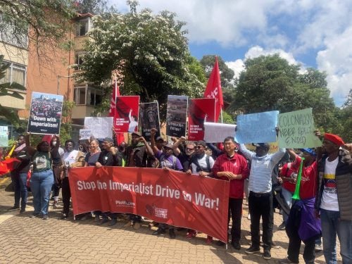 Activists carrying placards and chanting slogans as they attempted to approach the Kenyatta International Convention Centre (KICC) during protests outside the Africa Forward Summit in Nairobi CBD on May 12, 2026. PHOTO/@Morrison_litie/X