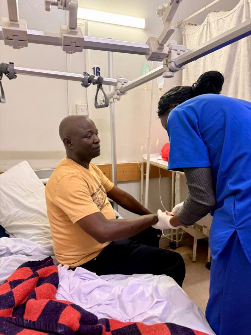 Central Police Station OCS Dishon Angoya at the hospital on May 19, 2026. PHOTO/@bonifacemwangi/X