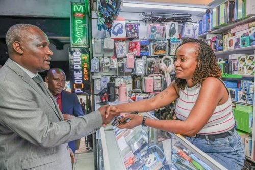 CS John Mbadi engaging mobile phone retailers and electronics traders along Moi Avenue in Nairobi on Tuesday, May 26, 2026. PHOTO/@JohnMbadiN/X
