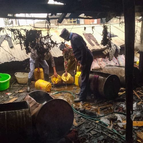 NPS officers leading the crackdown of the illicit brews in Kahawa, Nairobi. PHOTO/@NPSOfficial_Ke/X