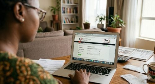 A woman files her tax returns on the KRA website. Image used for illustration purposes only.