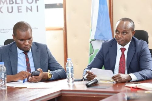 Makueni County Assembly chair person Speaker Douglas Mbilu, (left) with Jades Kalunda (right) during the vetting process in the County Assembly of Makueni Board room. PHOTO/Faustine Kameti