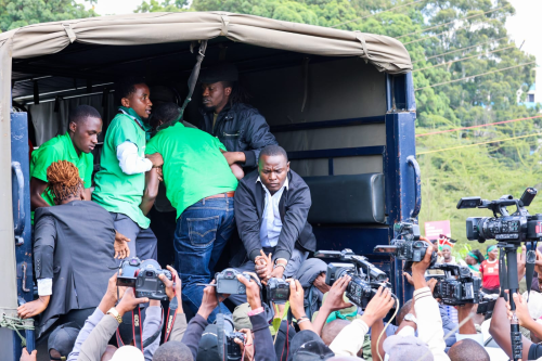 Former CJ David Maraga being bundled into a police lorry during his arrest. PHOTO/@UGMParty/X