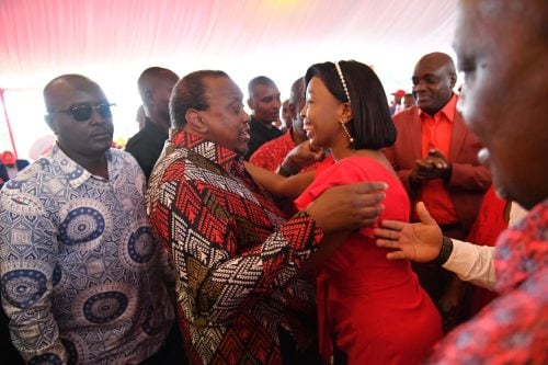 Jubilee's Deputy Organising Secretary Pauline Njoroge shares a hearty moment with Jubilee Party Leader Uhuru Kenyatta. PHOTO/https://www.facebook.com/paulinenjoroge