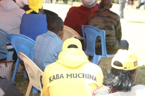 A resident (probably Nyandarua) wearing a yellow branded hoodie written Kaba Muchina which loosely translates to It's better Muchina. PHOTO/https://web.facebook.com/MwangiKiunjuriHon