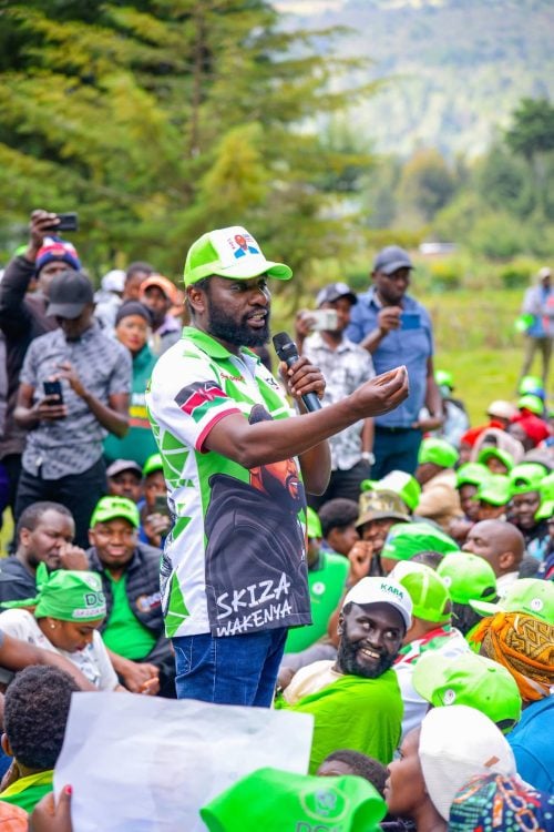 DCP candidate gestures as he delivers a keynote speech during a campaign rally in Ol Kalou ahead of the Thursday, July 16, 2026vote. PHOTO/https://web.facebook.com/kamausammyngotho