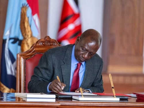 President William Ruto signs the Central Bank and Parliamentary Pensions Bills into law at State House, Nairobi. PHOTO/@WilliamsRuto/X