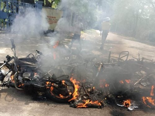 Motorbikes engulfed in flames following the disruption of an event attended by James Orengo and Edwin Sifuna on Sunday, July 12, 2026. PHOTO/@HEBabuOwino/X