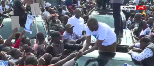 Edwin Sifuna receiving money from supporters during Kiminini stopover. PHPOTO@K24Tv/X